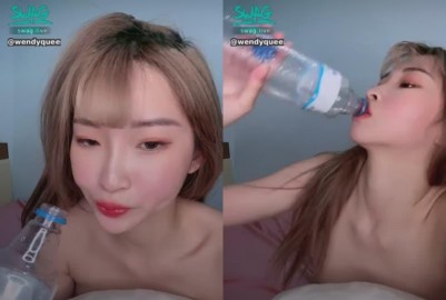 外拍模特喝水露奶 好會吞